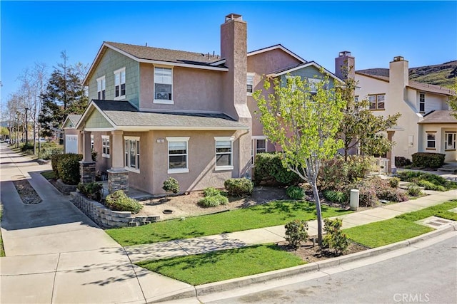 1961 Devaul Ranch Dr, San Luis Obispo, CA 93405 - view of front facade featuring stucco siding and a chimney