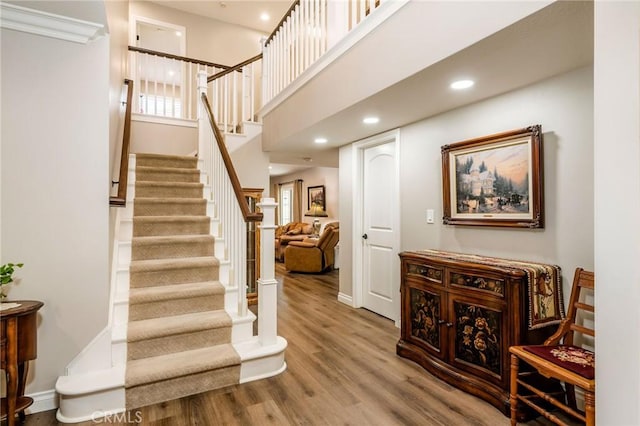 17851 Nearbank Dr, Rowland Heights, CA 91748 - stairway with recessed lighting, wood finished floors, a towering ceiling, and baseboards