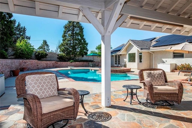 view of pool featuring a diving board, a fenced backyard, a patio, an in ground hot tub, and a fenced in pool