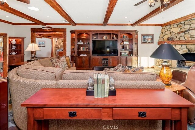 living room with ornamental molding, beamed ceiling, ceiling fan, and recessed lighting