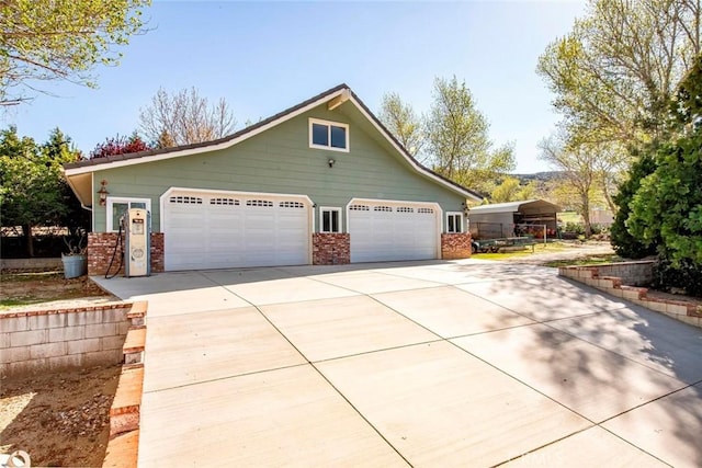 view of front of home featuring brick siding
