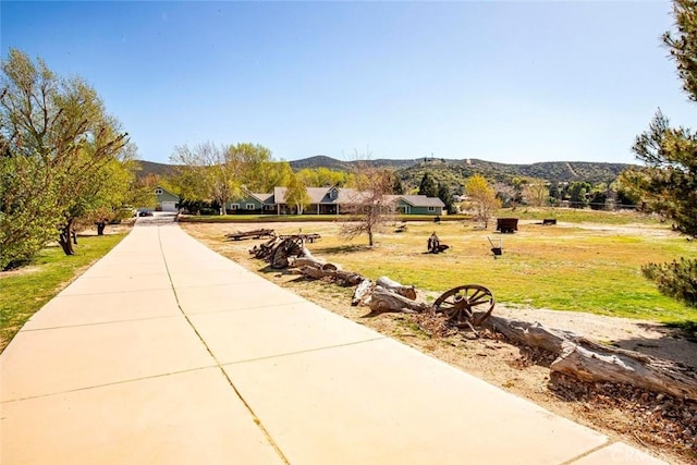 view of community with a mountain view