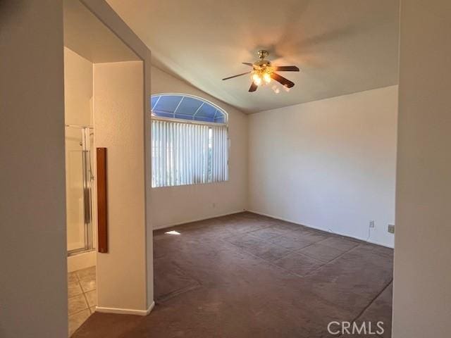 11950 Reichling Ln, Whittier, CA 90606 - unfurnished room with a ceiling fan, vaulted ceiling, and carpet floors