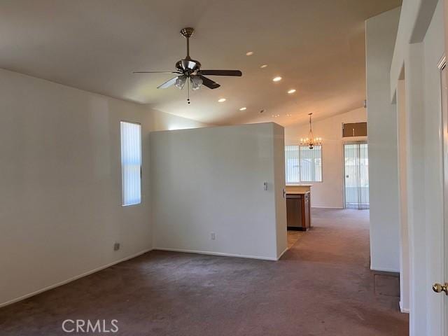 11950 Reichling Ln, Whittier, CA 90606 - carpeted empty room with ceiling fan with notable chandelier, baseboards, lofted ceiling, and recessed lighting