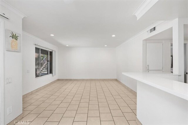 778 La Tierra St Unit H102, Corona, CA 92879 - spare room with crown molding, recessed lighting, and baseboards