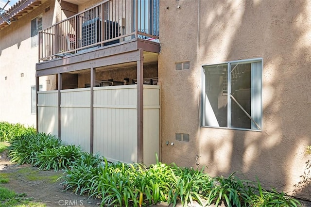 778 La Tierra St Unit H102, Corona, CA 92879 - view of home's exterior featuring a balcony and stucco siding