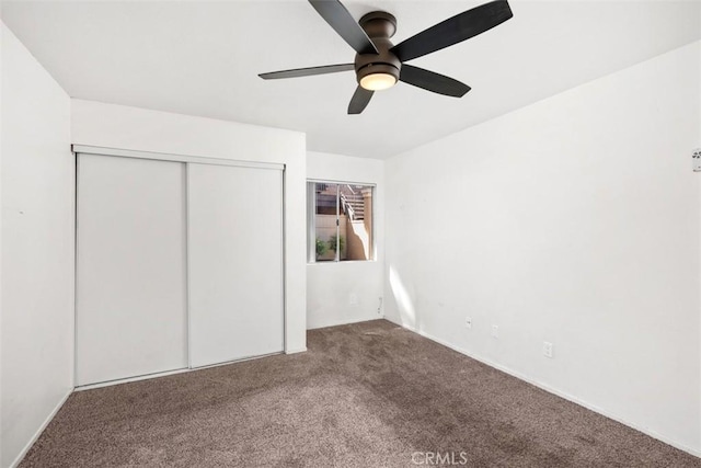 778 La Tierra St Unit H102, Corona, CA 92879 - unfurnished bedroom featuring carpet floors, a closet, and a ceiling fan