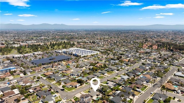 bird's eye view with a mountain view