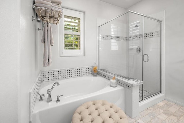 3477 Filoli Cir, Carlsbad, CA 92009 - bathroom with a stall shower, a garden tub, and baseboards