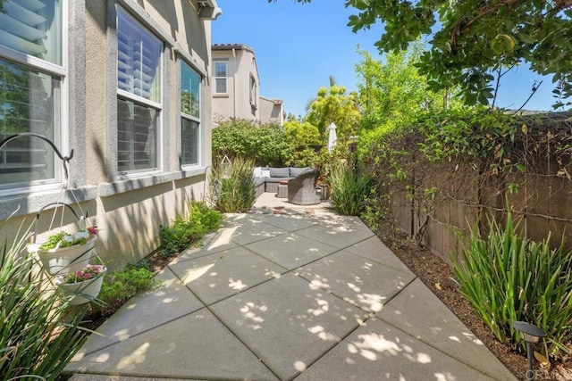 3477 Filoli Cir, Carlsbad, CA 92009 - fenced backyard featuring a patio and an outdoor hangout area