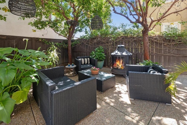 3477 Filoli Cir, Carlsbad, CA 92009 - fenced backyard with outdoor lounge area and a patio area