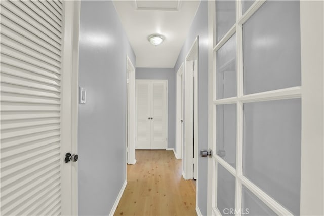 8731 Bel Air St, Buena Park, CA 90620 - corridor featuring light wood finished floors and baseboards