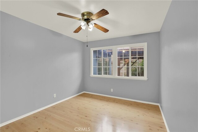 8731 Bel Air St, Buena Park, CA 90620 - unfurnished room featuring wood finished floors, a ceiling fan, and baseboards