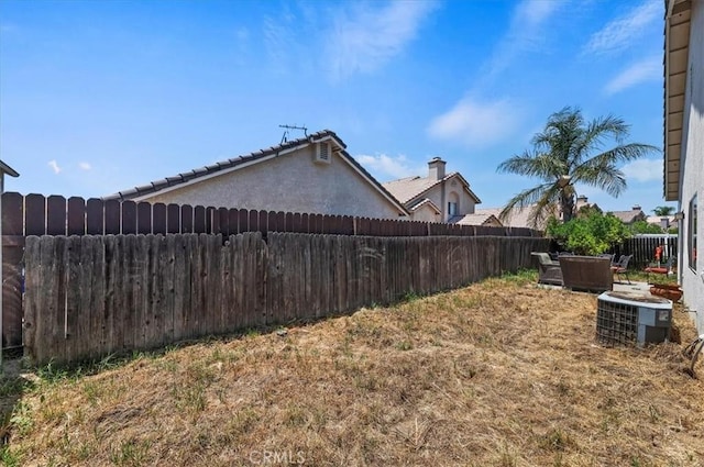 5166 Contay Way, Jurupa Valley, CA 92509 - fenced backyard featuring cooling unit