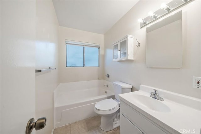 full bathroom featuring toilet, a garden tub, vanity, and tile patterned flooring