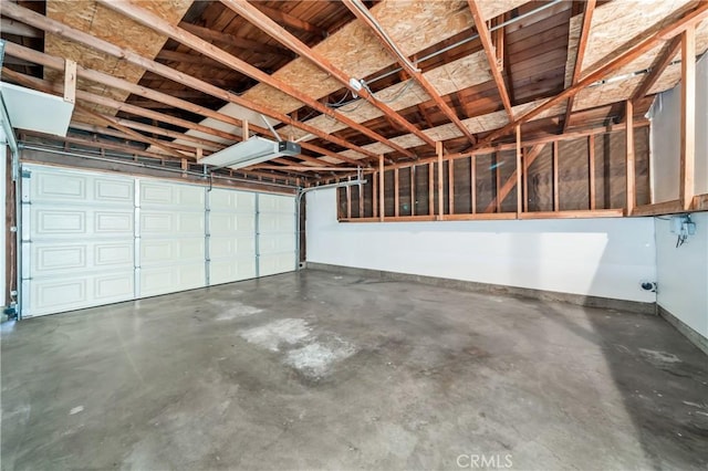 garage featuring baseboards