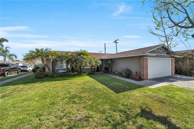 ranch-style house featuring stucco siding, a front yard, brick siding, an attached garage, and driveway