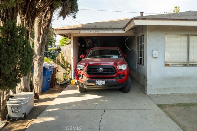 9925 Woodrich Ln, El Monte, CA 91731 - view of parking with a carport and concrete driveway