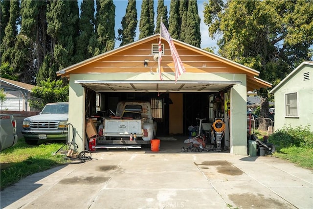 9925 Woodrich Ln, El Monte, CA 91731 - view of front of house featuring a garage and stucco siding