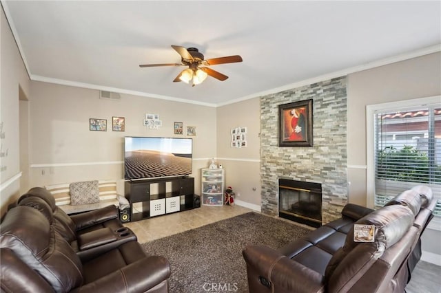 40540 Windsor Rd, Temecula, CA 92591 - living area with a ceiling fan, ornamental molding, a stone fireplace, baseboards, and tile patterned floors