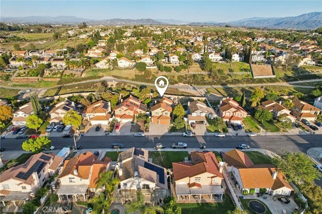 bird's eye view featuring a residential view and a mountain view