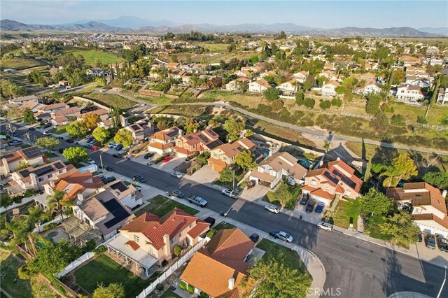 drone / aerial view with a residential view and a mountain view
