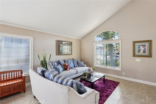 living room featuring lofted ceiling, baseboards, ornamental molding, and light tile patterned flooring
