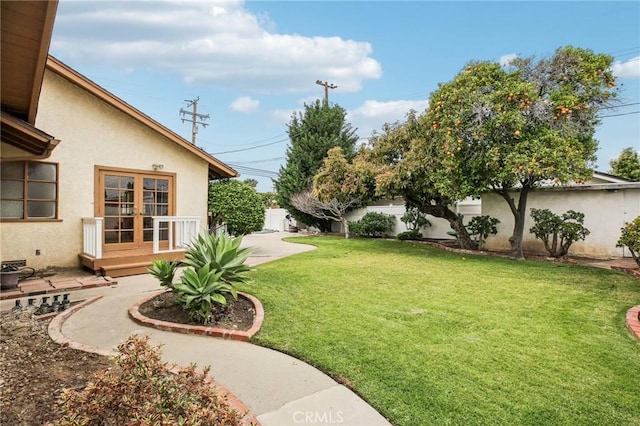 view of yard featuring a fenced backyard and a patio
