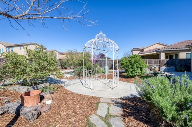 view of yard featuring a patio area and fence
