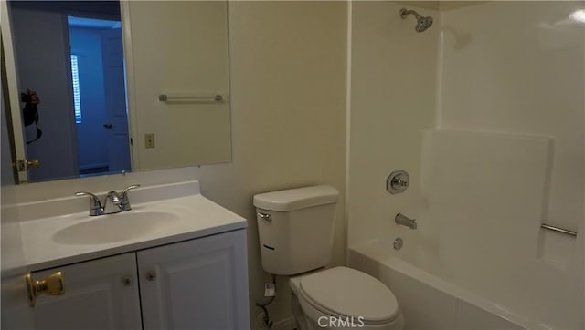 full bathroom with vanity, tub / shower combination, and toilet