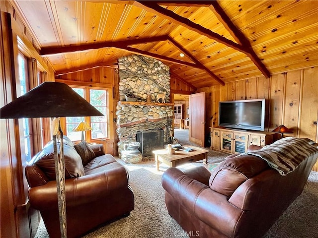 39121 Lake Dr, Bass Lake, CA 93604 - living area with wood ceiling, carpet, wood walls, and a stone fireplace