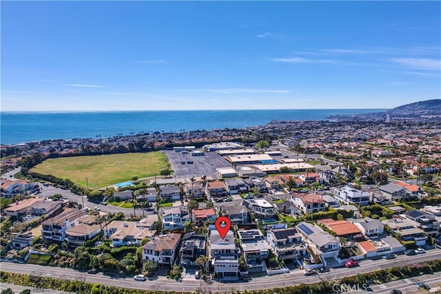 aerial view with a residential view and a water view