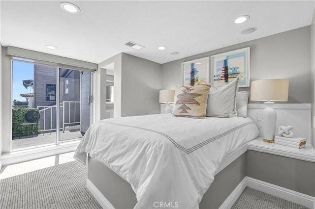 bedroom with access to exterior, recessed lighting, visible vents, and carpet floors