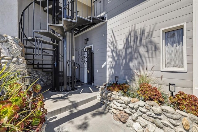 doorway to property featuring a balcony