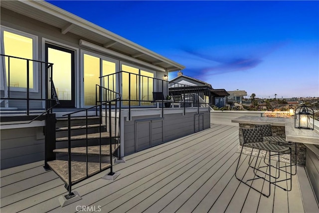 deck with an outdoor fire pit