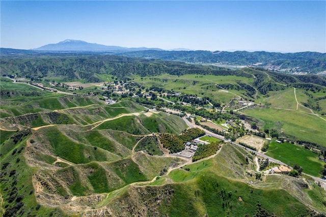 bird's eye view with a mountain view