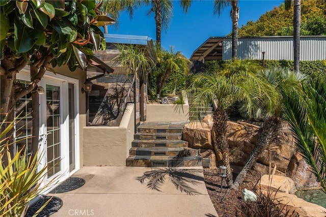 view of patio featuring french doors