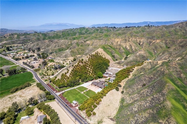 drone / aerial view featuring a mountain view