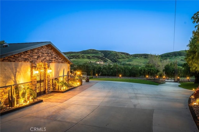 exterior space featuring a mountain view
