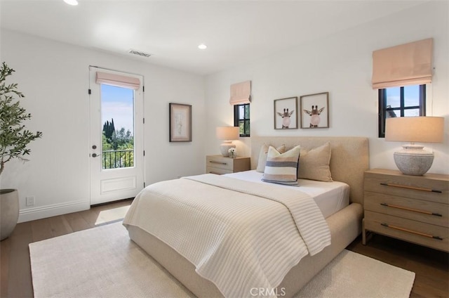 bedroom with visible vents, recessed lighting, access to outside, and multiple windows