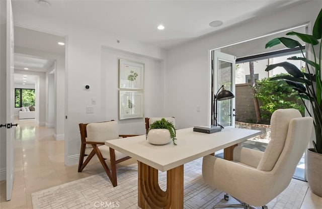 dining area with light tile patterned floors, recessed lighting, and baseboards