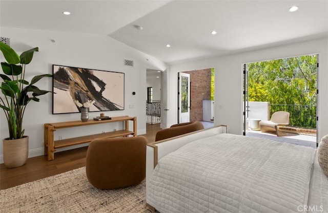 bedroom with baseboards, recessed lighting, vaulted ceiling, wood finished floors, and access to outside
