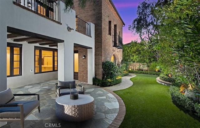 21 Observatory, Newport Coast, CA 92657 - patio terrace at dusk with a patio, a lawn, and a balcony
