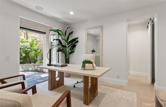 office with recessed lighting and baseboards