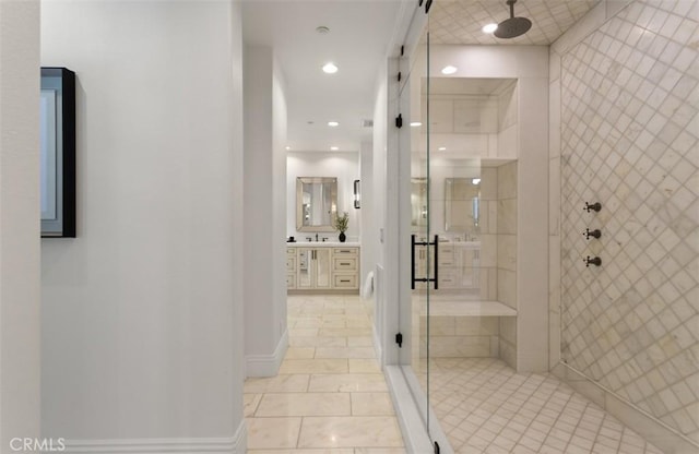 full bath with recessed lighting, tile walls, a shower stall, vanity, and tile patterned flooring