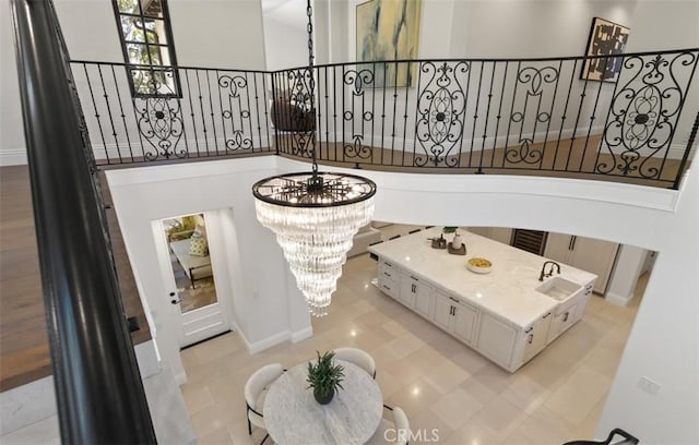 interior space with tile patterned flooring and baseboards
