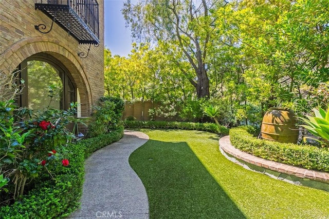 view of yard with fence