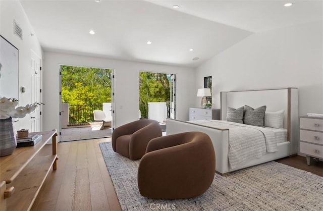 21 Observatory, Newport Coast, CA 92657 - bedroom with access to outside, lofted ceiling, hardwood / wood-style floors, and recessed lighting
