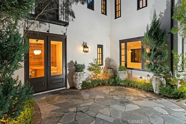 21 Observatory, Newport Coast, CA 92657 - entrance to property featuring french doors, stucco siding, and a patio