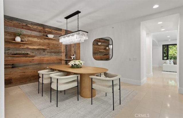 21 Observatory, Newport Coast, CA 92657 - dining space with wood walls, recessed lighting, and a chandelier
